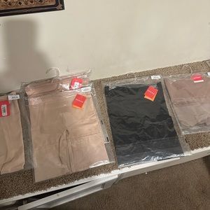 Brand new Spanx Sculpt mid- thigh shorts